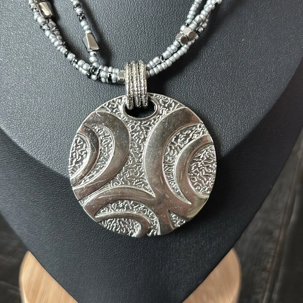 Lia Sophia Silver Tone Multistrand Beaded Circle Pendant
